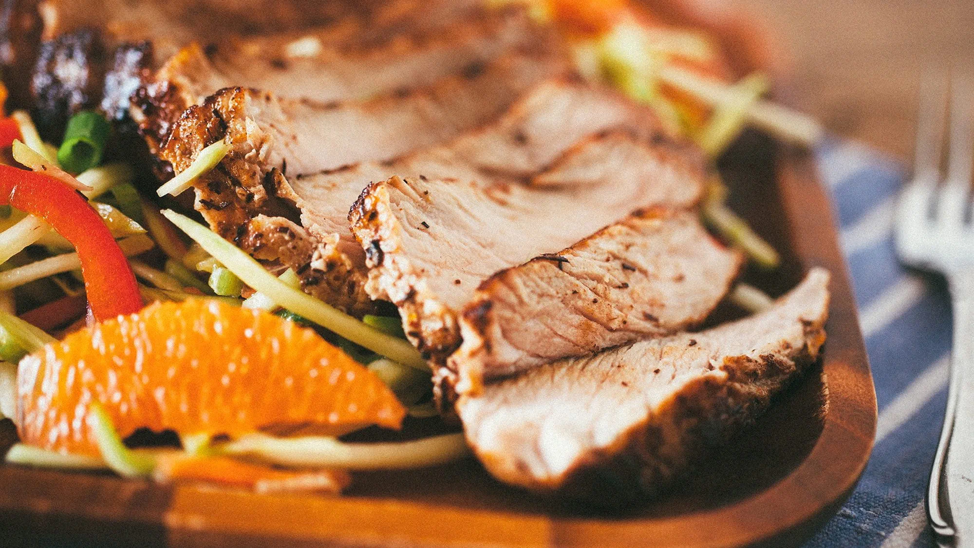 FIVE SPICE TEA-INFUSED PORK CHOPS WITH CITRUS SLAW